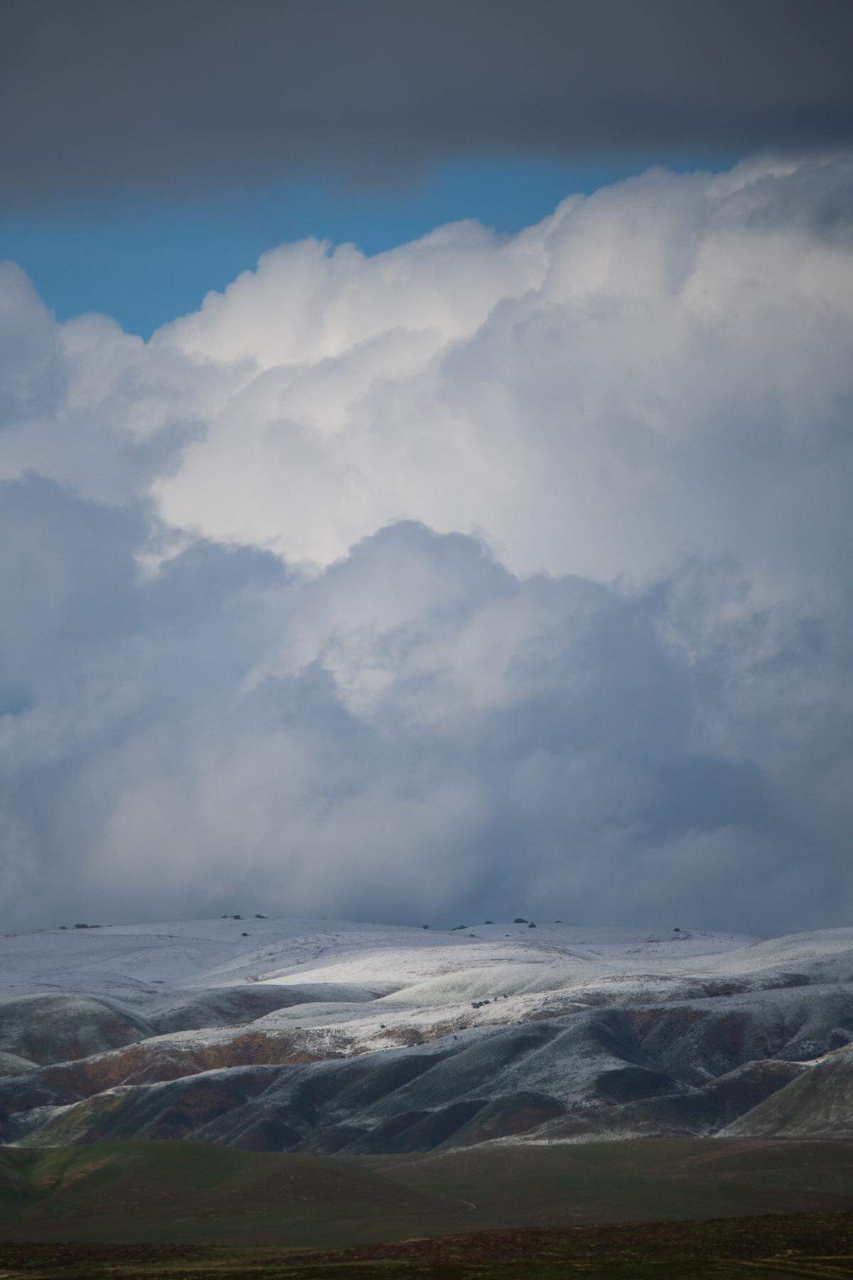 A first dusting of snow turned the Temblor Range white on Wednesday, Feb. 22, 2023, near the Carrizo Plain as a cold winter storm moves into California.