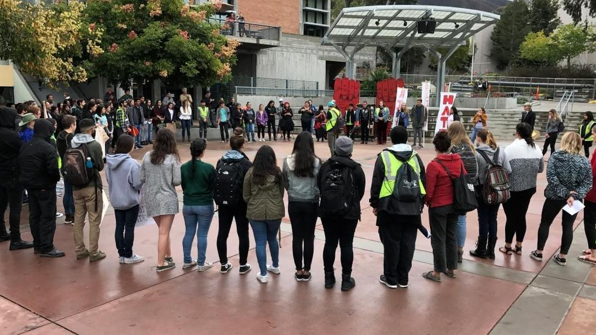 More than 100 people gathered Friday morning to join the “Rise Against Hate” march in protest against the Cal Poly College Republicans’ “Free Speech Wall.”