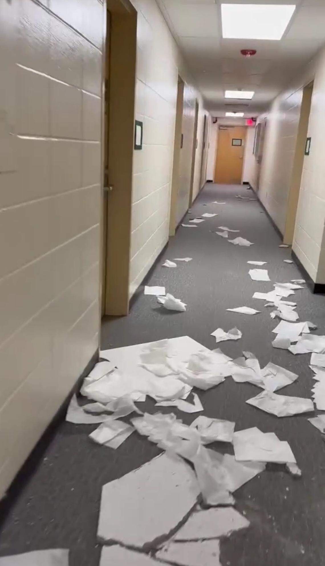 Screenshot of video showing broken ceiling tiles, trash littering a hallway in Tenaya Hall after an early-morning St. Patrick’s Day party left parts of campus damaged on March 16, 2024.