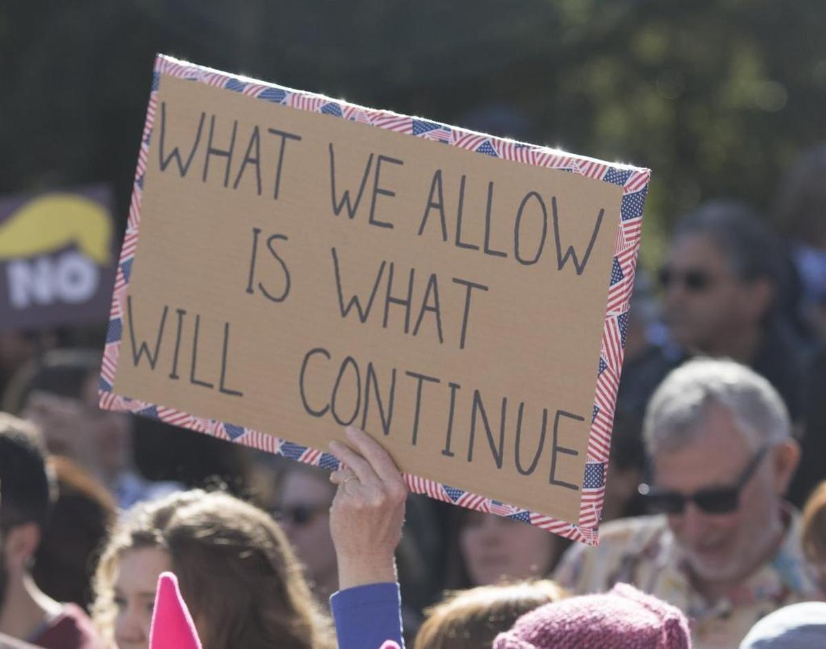 Signs from Saturday’s “Hear Our Vote: Voices of Resistance Rally.”