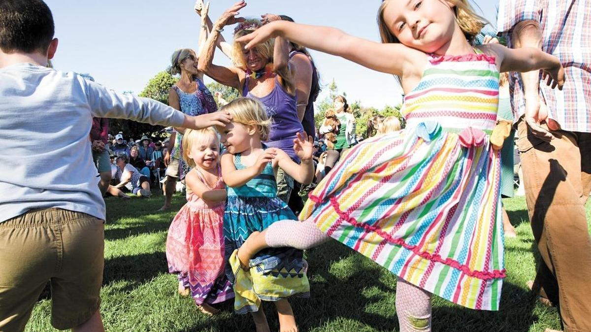 Young and old alike danced during the annual free Boatzart Concert in Baywood in 2014. The San Luis Obispo area ranked third in community well-being in a recent Gallup-Healthways Well-Being Index.