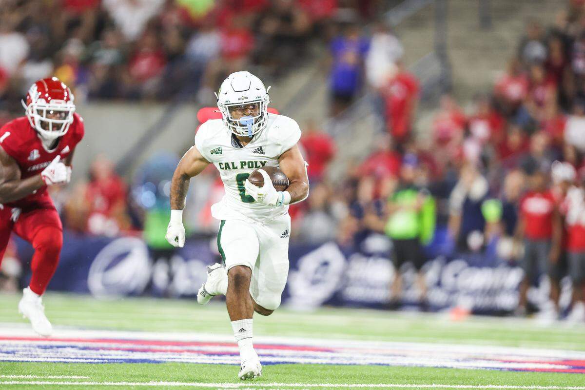 Shakobe Harper breaks off a run Shakobe Harper during Cal Poly’s 35-7 loss to Fresno State on Thursday, Sept. 1, 2022.
