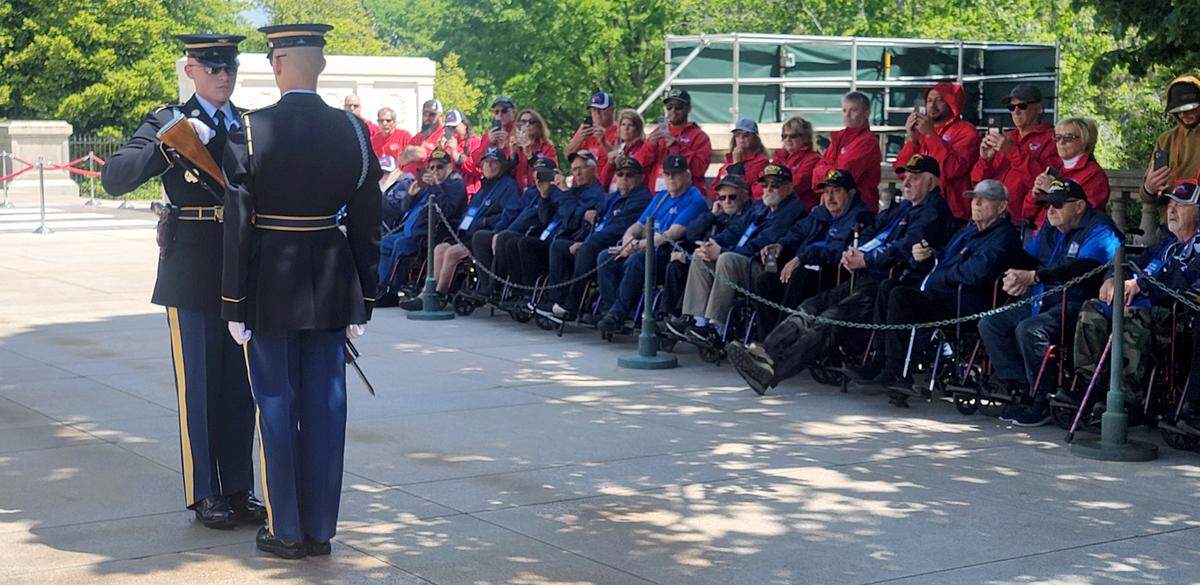 Honor Flight participants from the Central Coast watch the changing of the guard at the Tomb of the Unknown Soldier at Arlington Cemetery in Washington, D.C., on Tuesday, April 25, 2023.