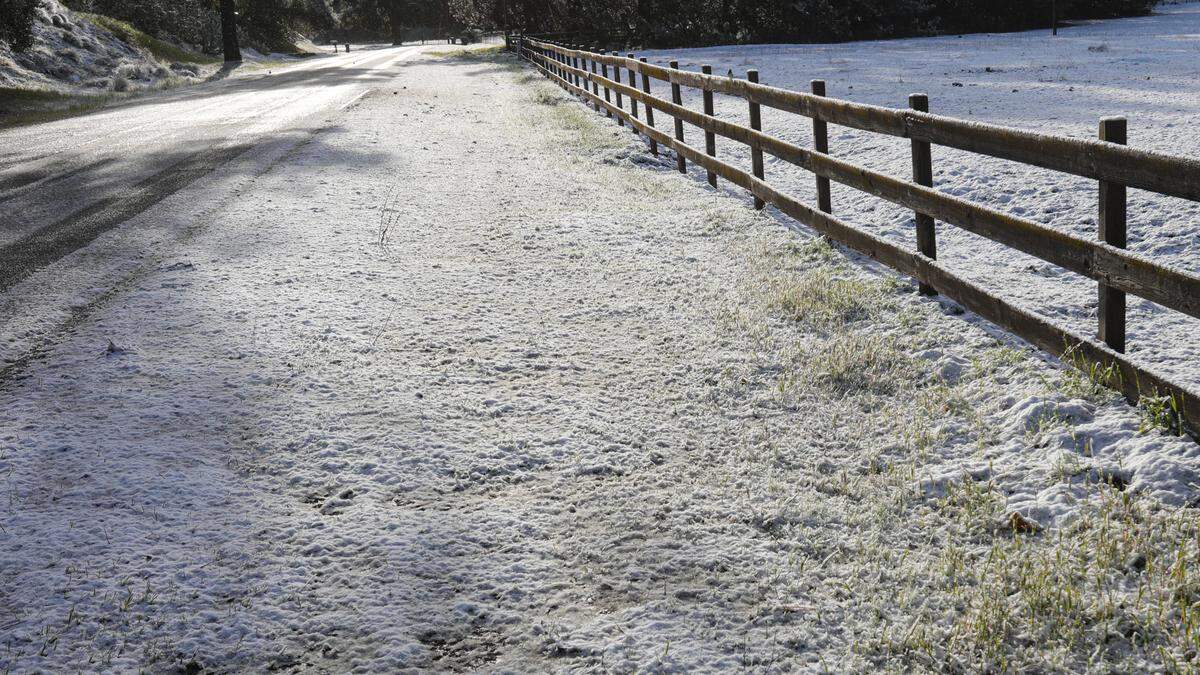 Snow turned fields and a fenceline white next to Parkhill Road on Feb. 23, 2023.