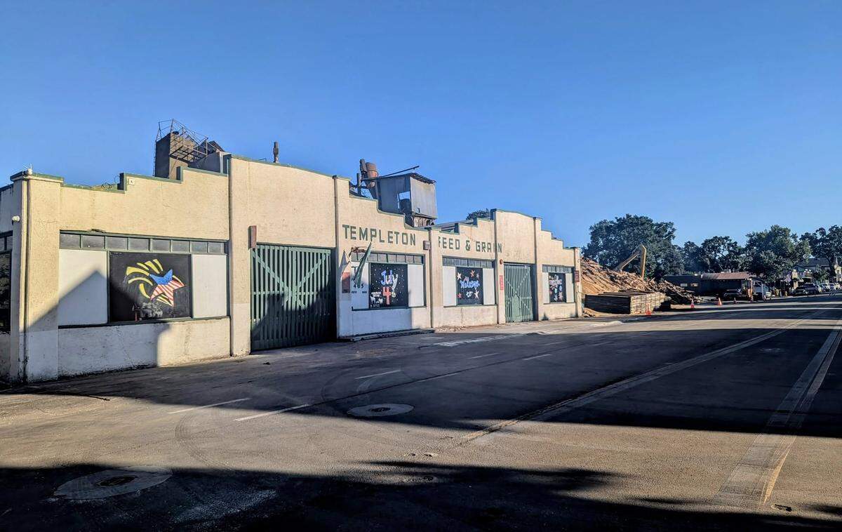 All that remains of Templeton Feed & Grain’s iconic towers is a massive pile of rubble after the structure’s demolition was completed on Wednesday, July 8, 2025. At left is the original concrete building, which dates to 1912 and survived the blaze.