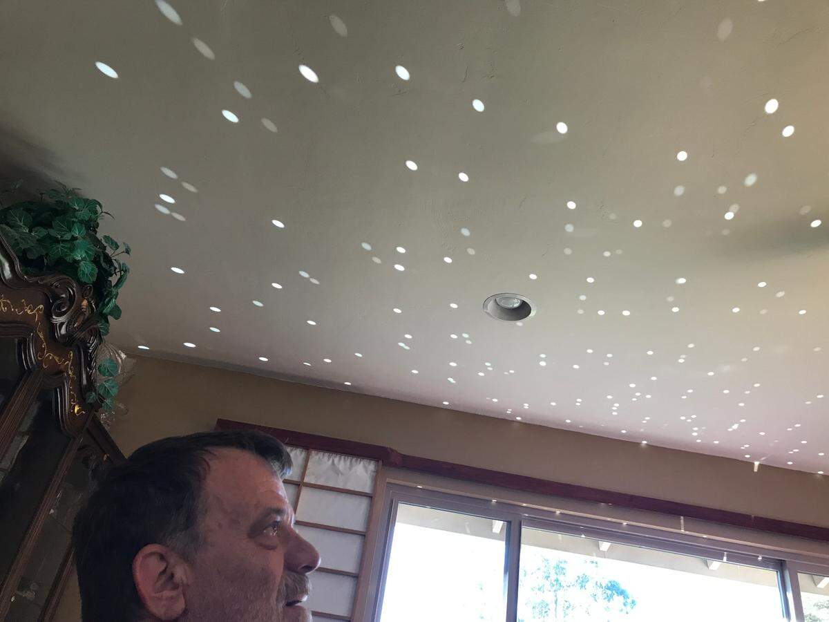 Disco-ball fairy dust sprinkles magic across the dining room ceiling of columnist Kathe Tanner’s Cambria home.