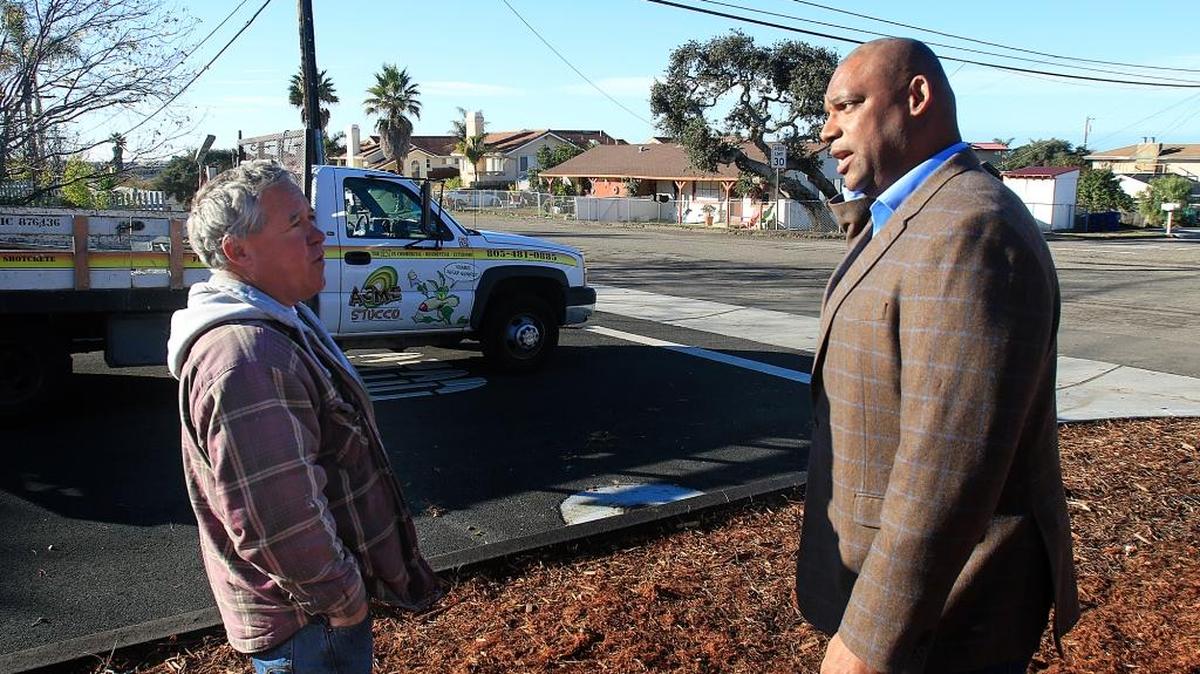 Mayor John Shoals talks with Alan Newmann, a Grover Beach native, about the recent work that has been done on Brighton Avenue.