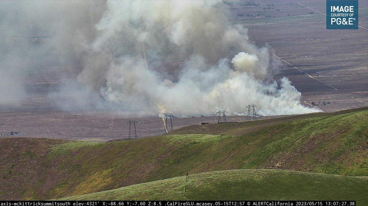 View from McKittrick Summit South camera looking at California Valley shows a reported structure fire near Angwin Trail.