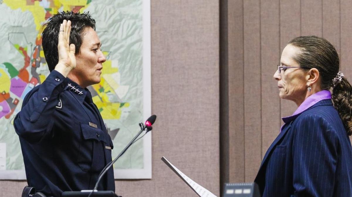 San Luis Obispo’s new police chief, Deanna Cantrell, is sworn in by City Clerk Traci McGinley at a City Council meeting Tuesday.