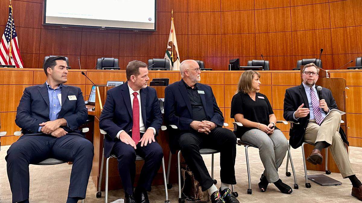 County supervisor Jimmy Paulding, program expert Paul Stamper, Cal Poly professor Eric Olson, Radiology Associates Chief Administrative Officer Marci Miller, and Planning and Building Department director Trevor Keith discuss Lean Sigma Six, a program to increase efficiency in SLO County’s operations on Tuesday, July 25, 2023.