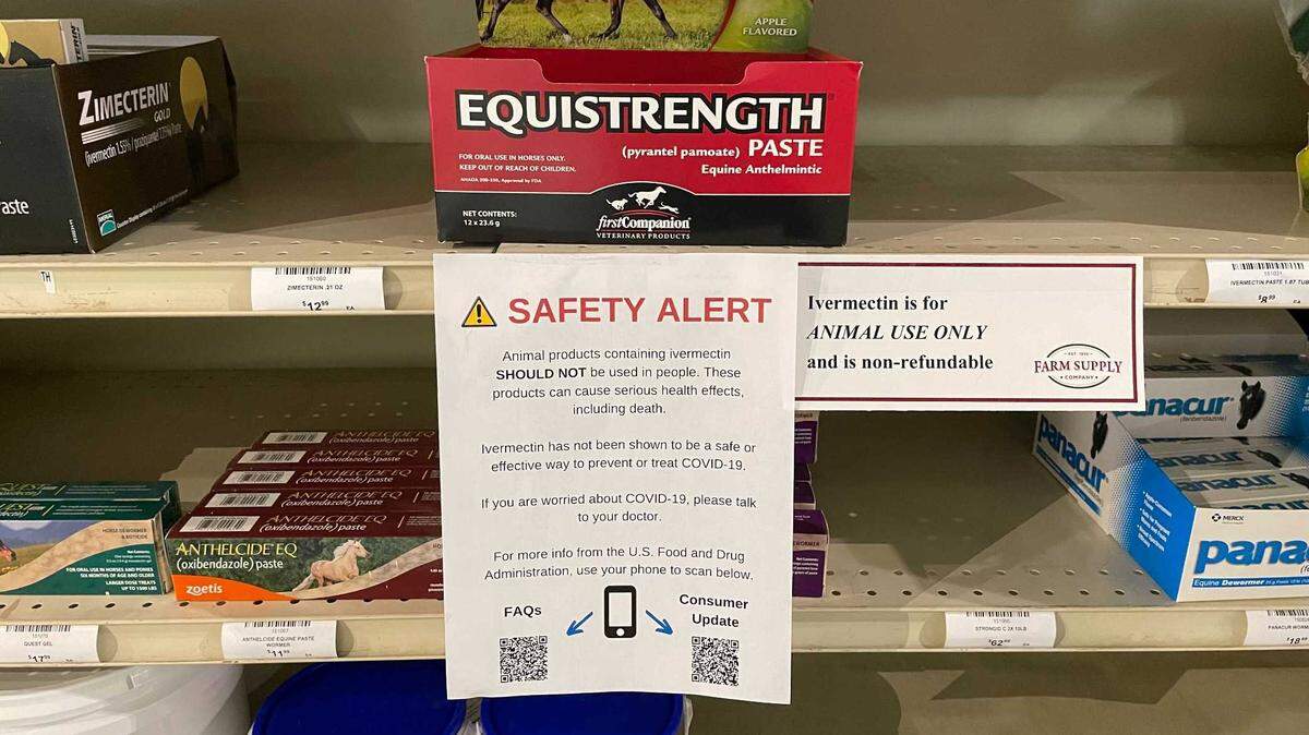 Signs warn against human use of ivermectin at Farm Supply in San Luis Obispo in 2021.