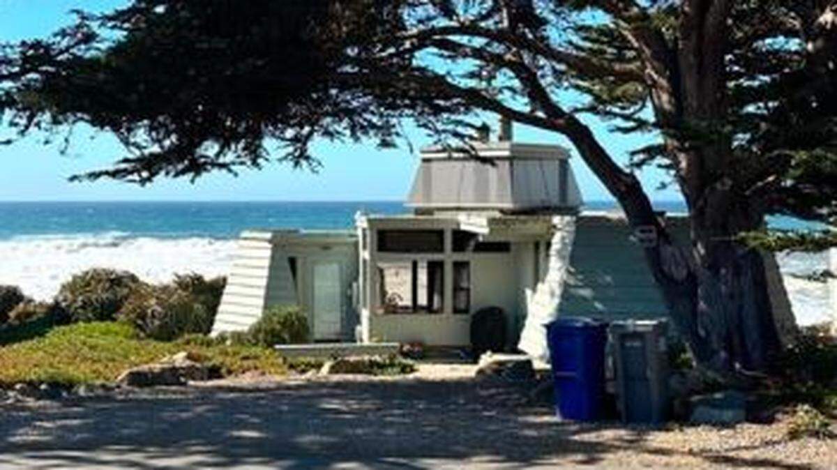 The state Coastal Commission will rule in August 2025 whether this tiny oceanfront cottage in Cambria can be removed and replaced with a much larger structure.  Noted architectural designer/builder Warren Leopold created the cottage in 1965.