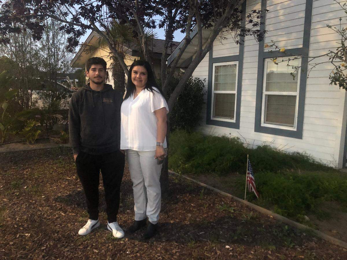 Arroyo Grande High School football player Adrian Sanchez with his mother, Melissa.