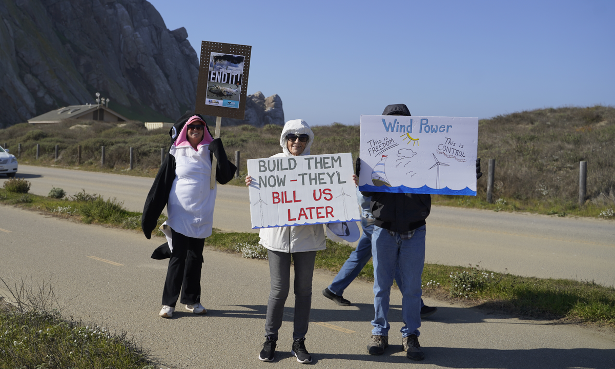 Picketers joined REACT Alliance at Morro Rock to protest offshore wind development on Jan. 18, 2025.