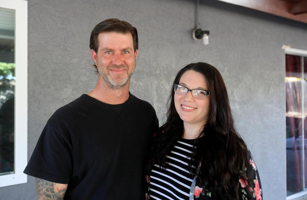 Nichole and Rich LaRue at their new home in Paso Robles. Nichole bought her first home with help from a USDA loan program.