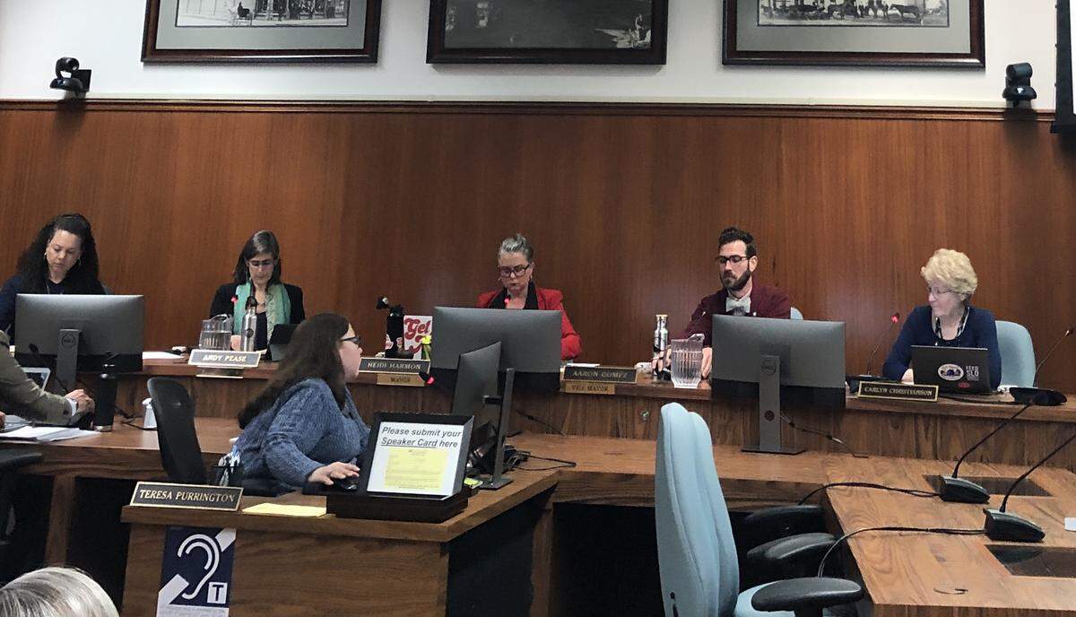 San Luis Obispo’s City Council. From left to right are: Erica Stewart, Andy Pease, Heidi Harmon, Aaron Gomez and Carlyn Christianson. At front is city clerk Teresa Purrington.