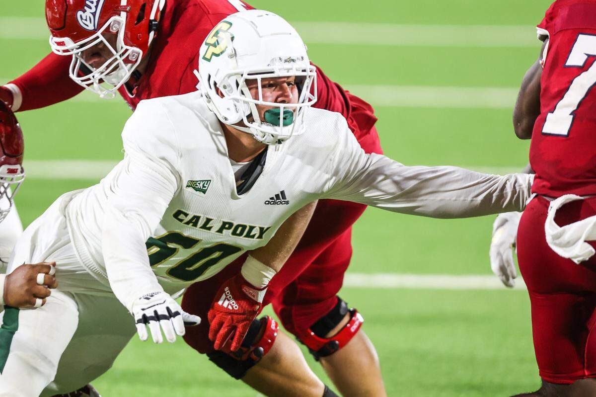 Ethan Rodriguez tries to make a tackle during Cal Poly’s 35-7 loss to Fresno State on Thursday, Sept. 1, 2022.