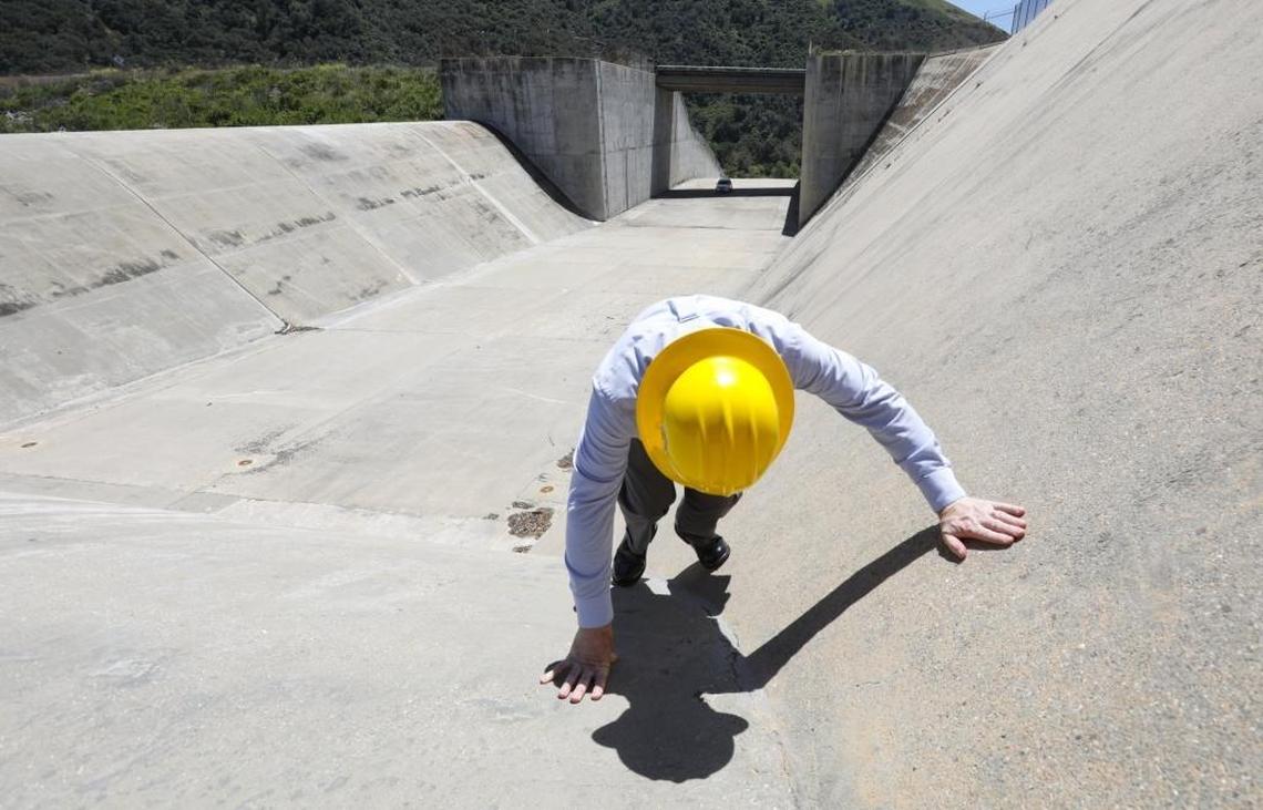 Mark Hutchinson, deputy director of SLO County Public Works, leads tour of the Lopez Dam spillway.
