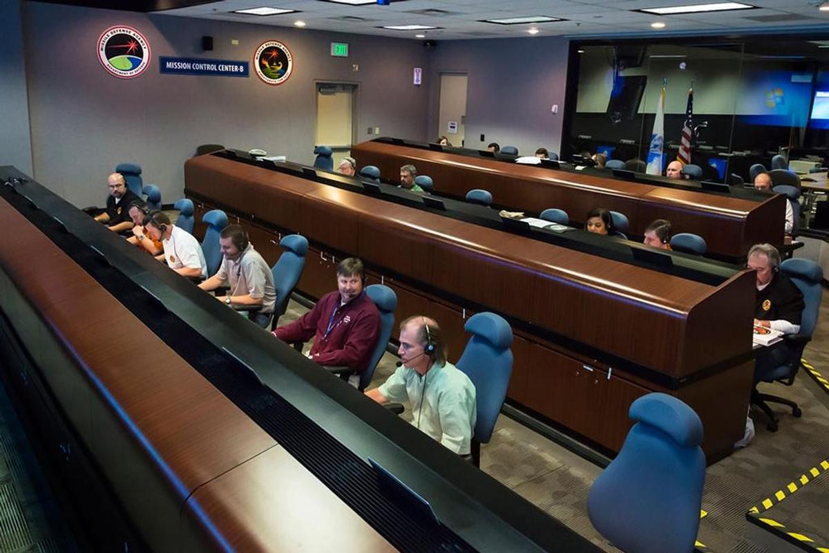 Personnel at the Missile Defense Integration and Operation Center on Schriever Air Force Base in Colorado Springs, Colorado, work at the test control facility during a prior flight test for the Ground-based Midcourse Defense program.