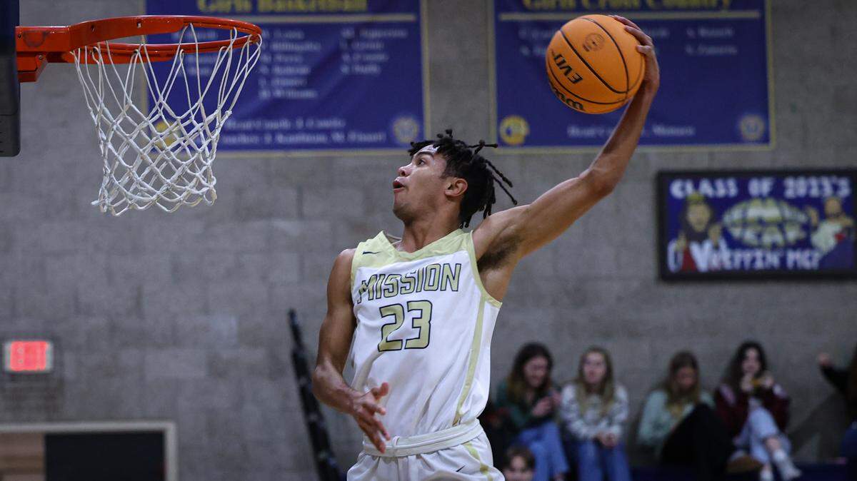 Jamar Howard completes a windmill dunk in Mission Prep’s 72-31 win over Atascadero on Jan. 6, 2023.