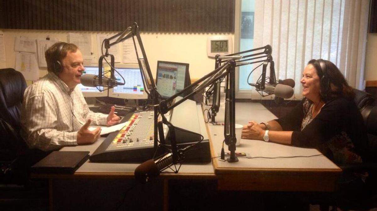 Local radio host Dave Congalton, left, interviews Mardi Hall. Congalton was seriously injured June 30 after being hit by a car in San Luis Obispo. He filed a lawsuit in San Luis Obispo Superior Court on Friday.