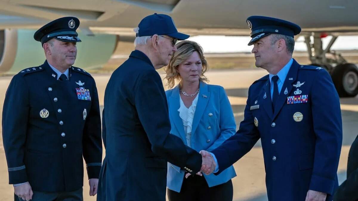 Former President Joe Biden shakes the hand of Col. Mark Shoemaker, Space Launch Delta 30 commander at Vandenberg Space Force Base, as Lt. Gen. Douglas Schiess, commander of U.S. Space Force, and his wife, Debbie, look on Monday afternoon, Jan. 20, 2025, at VSFB. The Bidens plan to spend their first few days out of office visiting the Santa Ynez Valley.