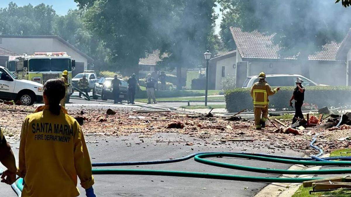 Debris and smoke in the aftermath of an explosion and fire in Santa Maria Wednesday.