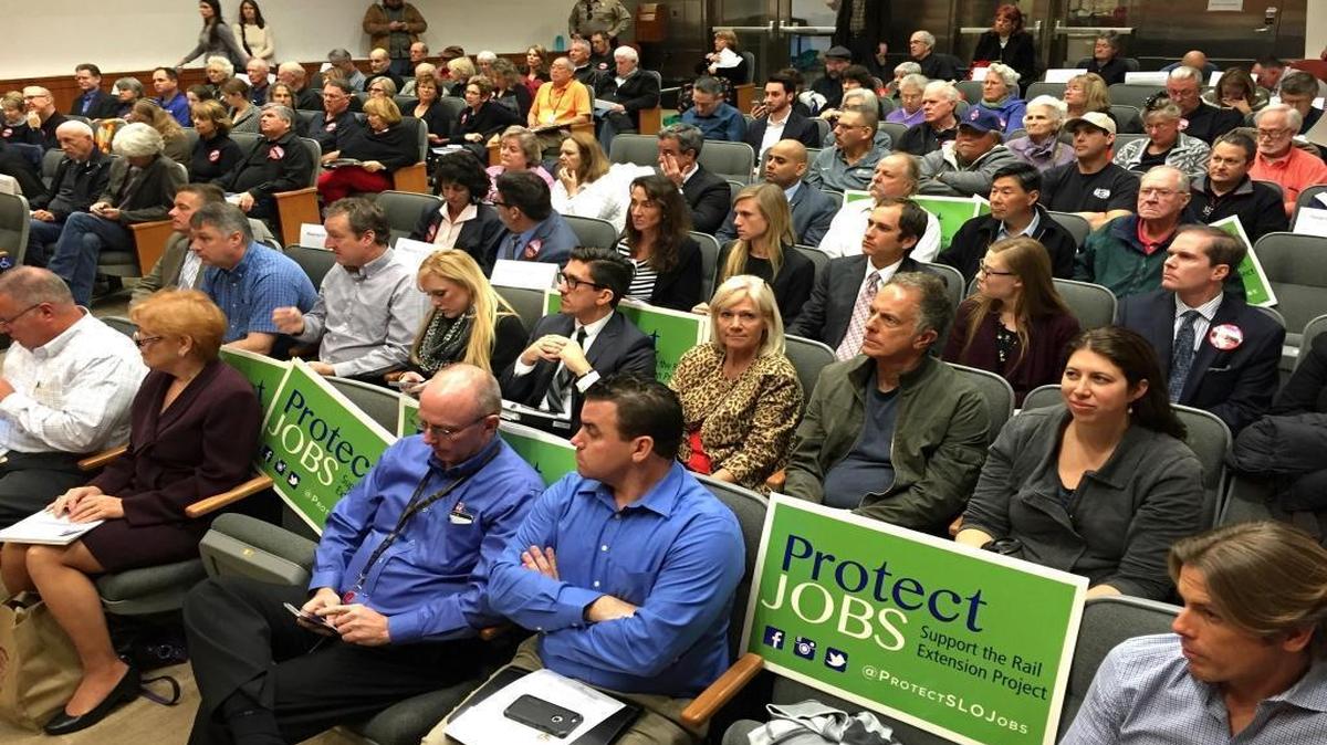 A Feb. 4, 2016 San Luis Obispo County Planning Commission hearing about a Phillips 66 Co. proposal to build a rail spur allowing it to bring crude oil by rail to its Nipomo refinery. Some supporters brought signs promoting the jobs the refinery provides.
