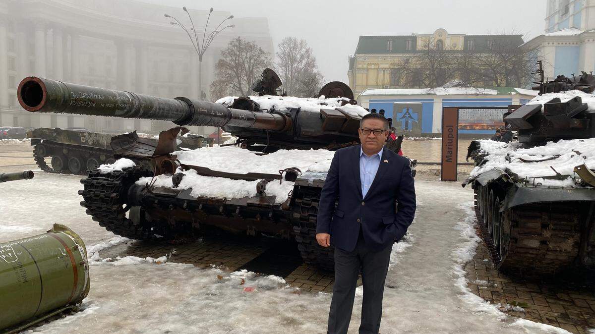 Rep. Salud Carbajal standing with Ukrainian tanks stationed in downtown Kiev on Saturday, Dec. 10, 2022.