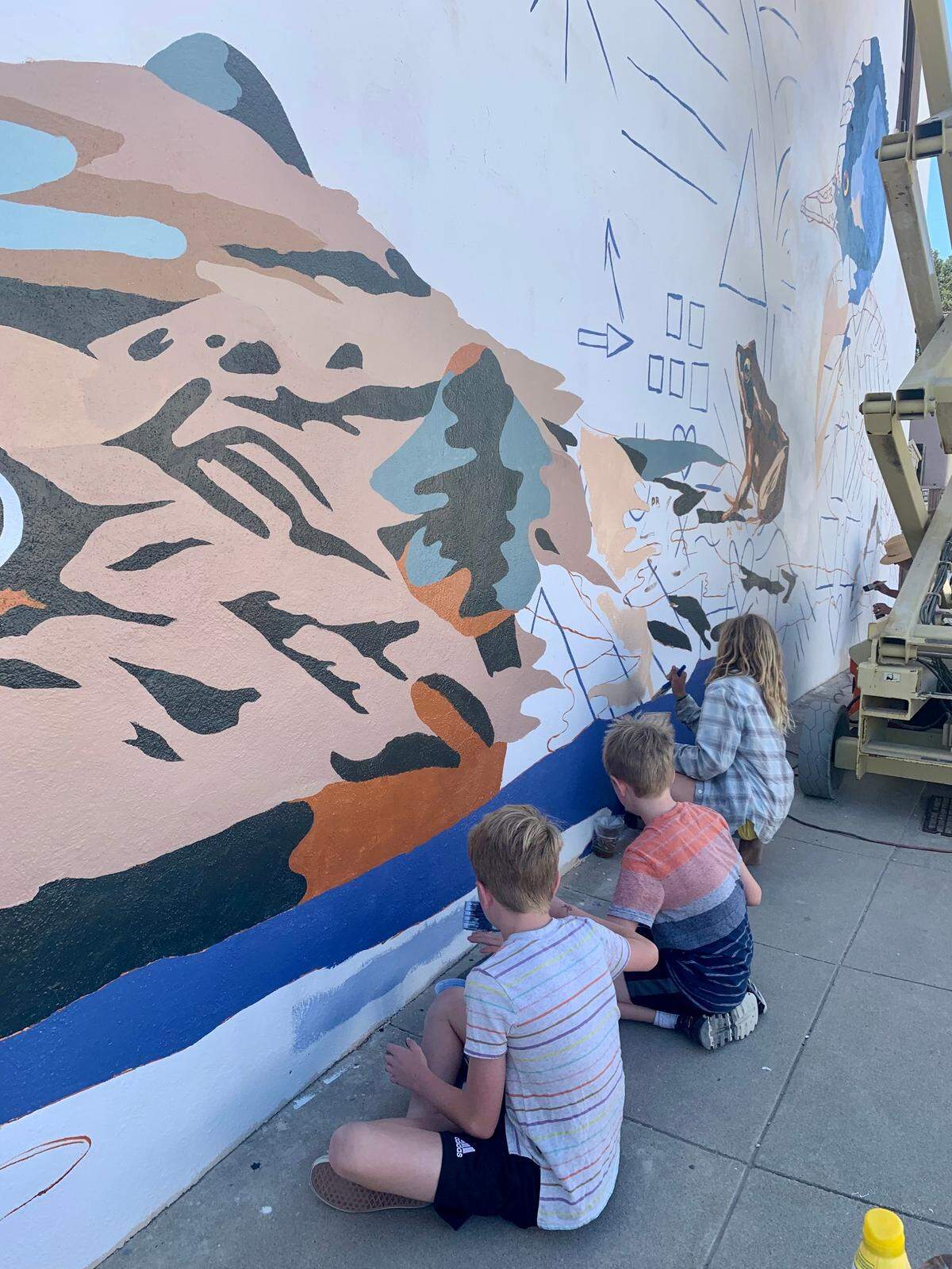 Young community members help with the mural “Nature is for Everyone” by artist Brandy Pippin. The mural, which was created for the Equality Mural Project, was recently unveiled in downtown Atascadero.