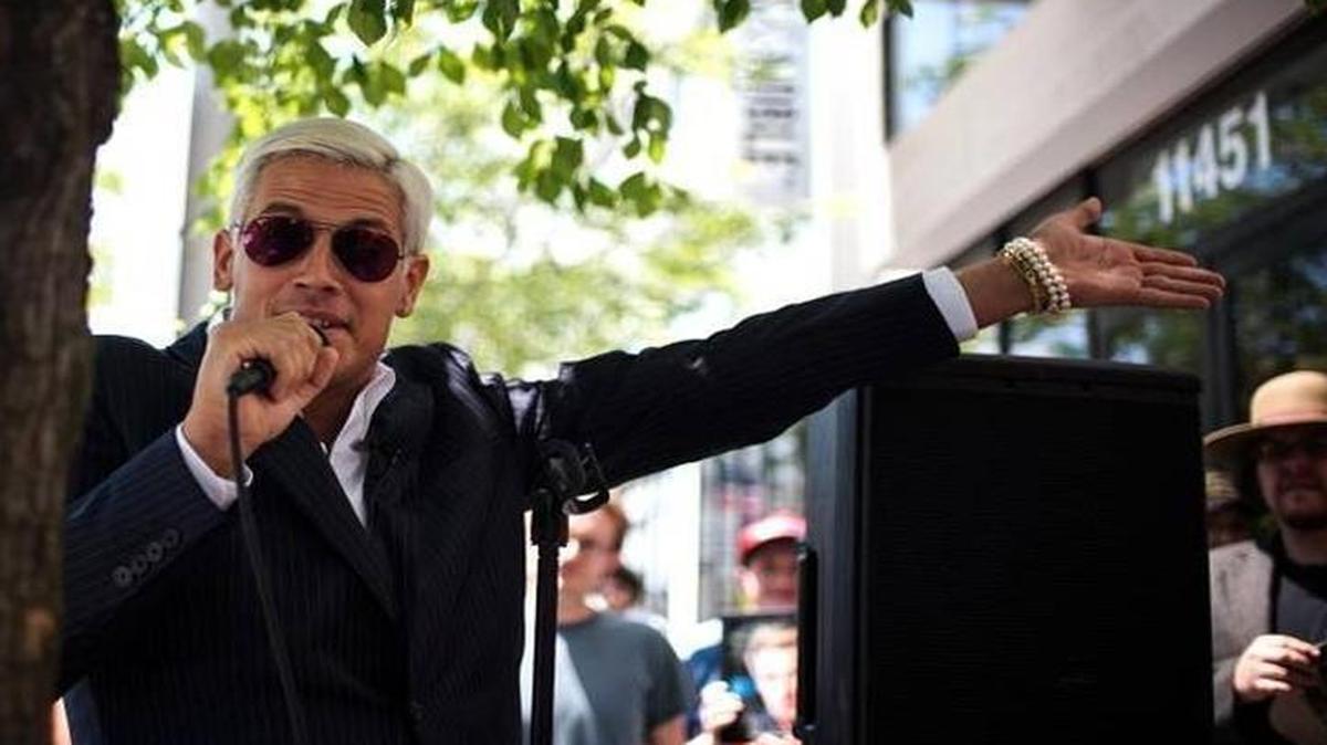 Milo Yiannopoulos, the Breitbart writer and “alt-right” personality, speaks with reporters at the Republican National Convention in Cleveland, July 19.
