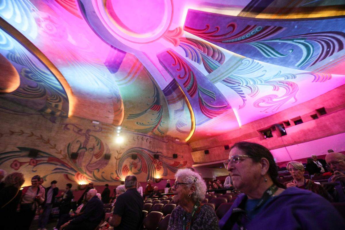 Susie Robbins and Joan Lerner watch a group of Cal Poly jazz students perform in the band 59 Jazz on opening night of the San Luis Obispo International Film Festival at the Fremont Theater on April 24, 2025.