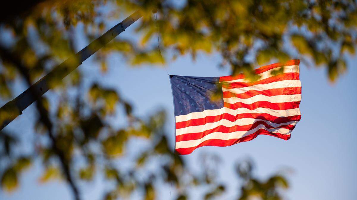 The American flag flies about Fourth of July festivities at Barney Schwartz Park in Paso Robles, on July 4, 2023.