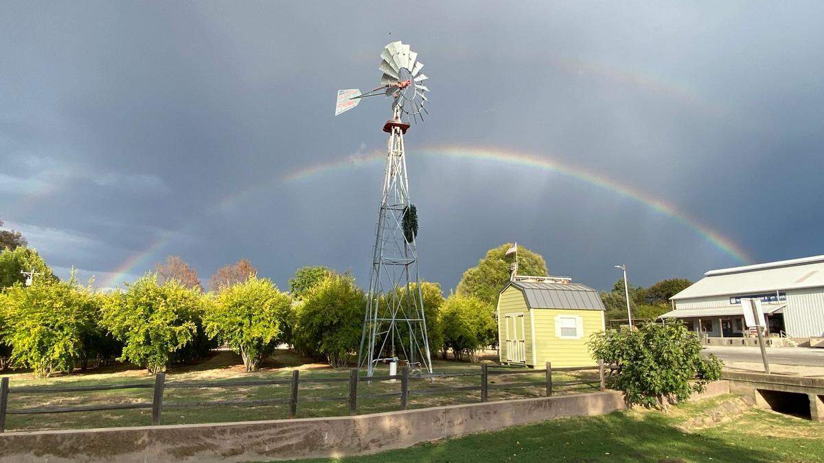 A rainbow stretched across Santa Margarita while a thunderstorm brewed in San Luis Obispo County on Sept. 19, 2024.