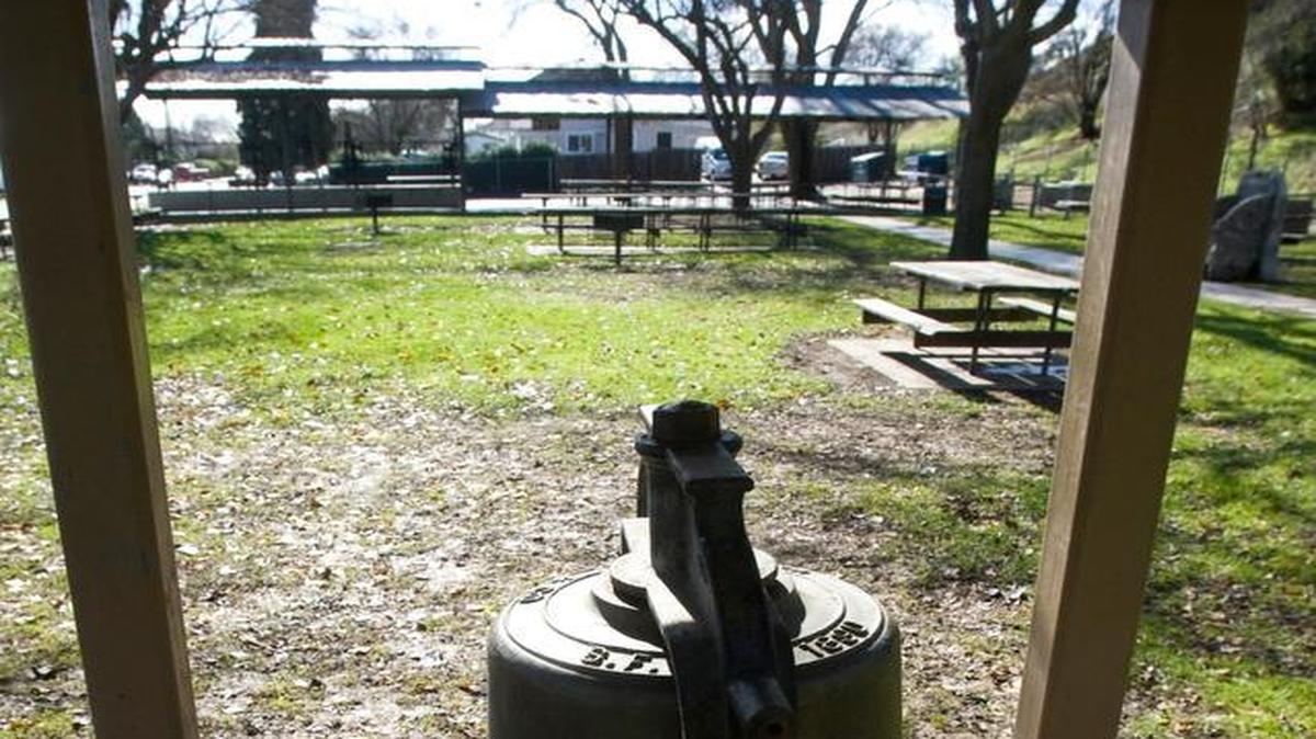 Sun shines on San Miguel Park in 2012. A county public works project slated to start Tuesday will widen L Street between 13th and 14th streets and remove one block of K Street, which bisects the park.