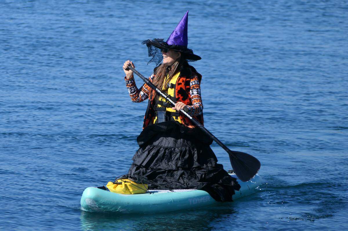 Hundreds of people turned out for the 10th annual Witches and Warlocks Paddle in Morro Bay on Oct. 29, 2023.