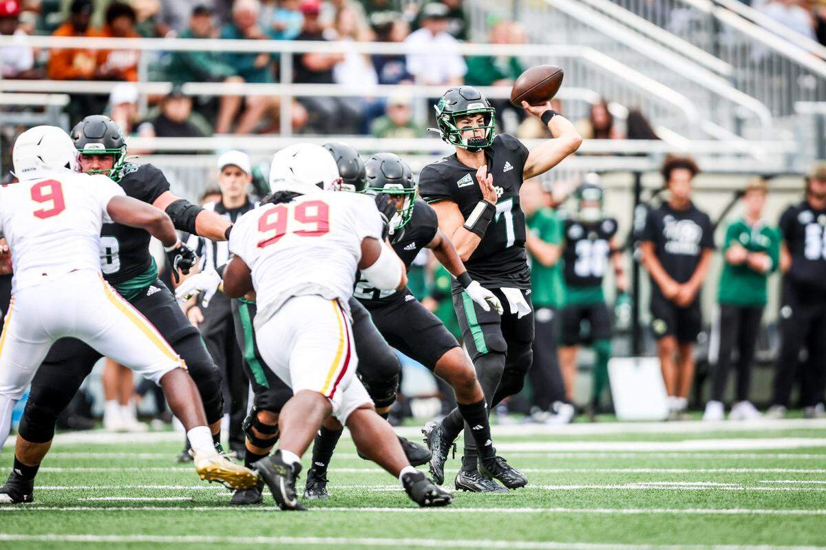 Cal Poly Mustangs quarterback Sam Huard (7) throws a first-half pass. The Cal Poly football team beat Lincoln 41-20 at home on Sept. 16, 2023.