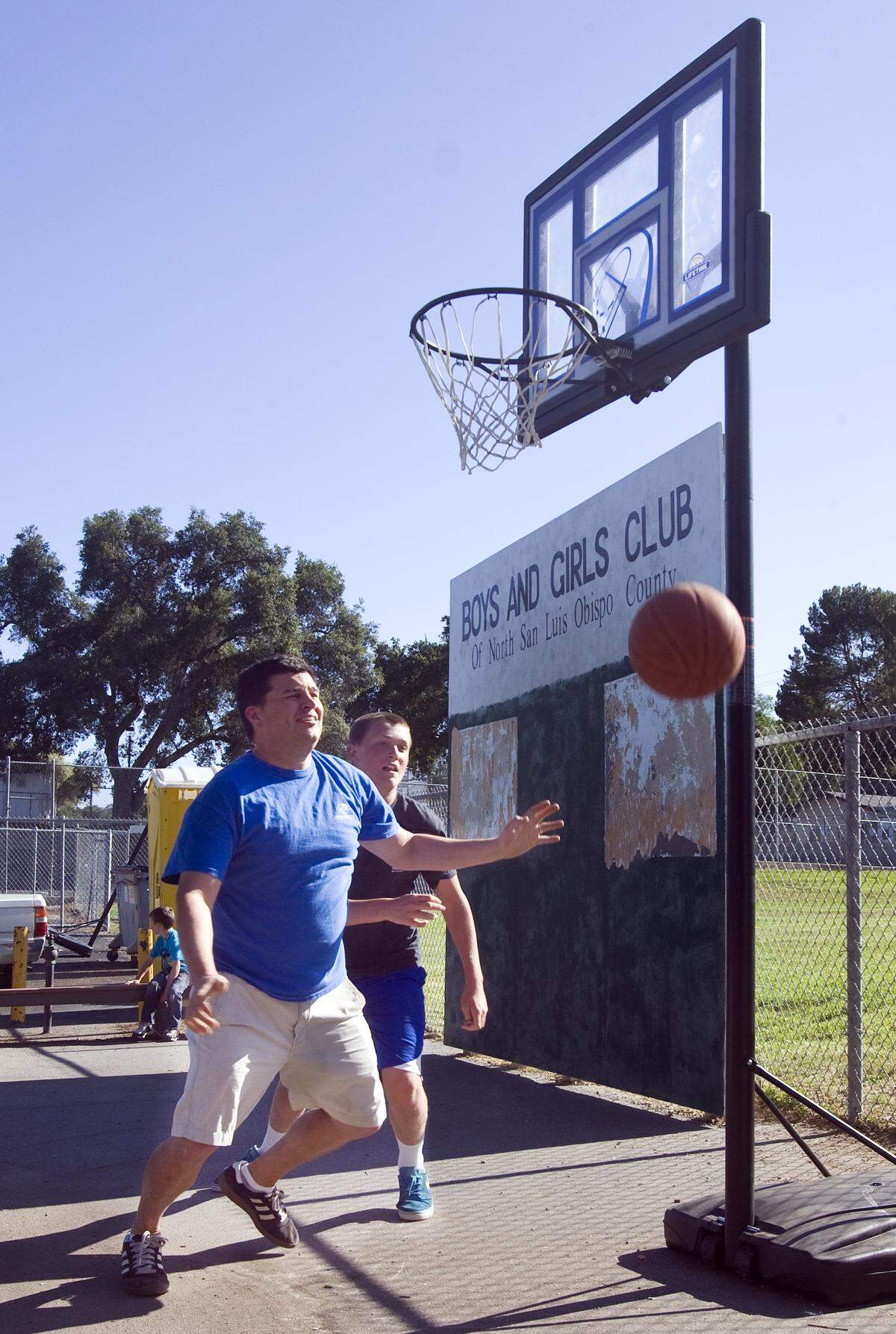 Jeremy Perales plays a friendly game of 1 on 1 with Scott Pedretti at the North County Boys and Girls Club in 2014. The Boys & Girls Clubs of Mid Central Coast is opening a new location serving middle school students in SLO in April.