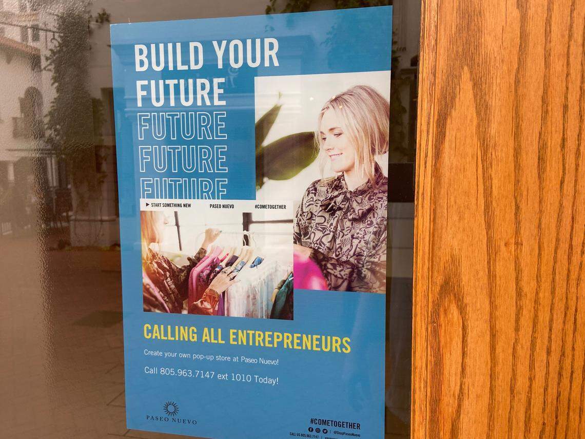 A sign advertising commercial lease spaces for rent in Paseo Neuvo in downtown Santa Barbara.