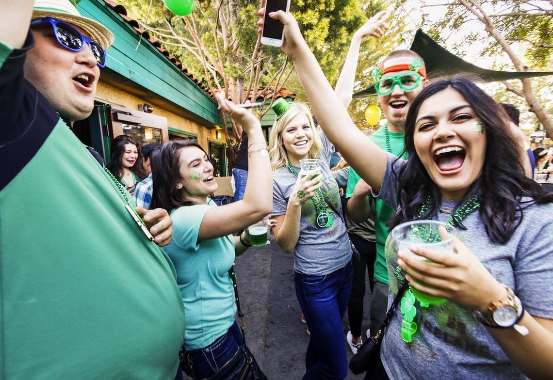 Donald Aardema, left, Taylor Margosian, Kaylyn Hofstee, Hans Gilkey and Faith Sierra celebrate St. Patrick’s Day in 2018 at McCarthy’s Irish Pub in downtown San Luis Obispo. The governor’s directive that bars close to curb the spread of coronavirus comes just days before this year’s holiday.
