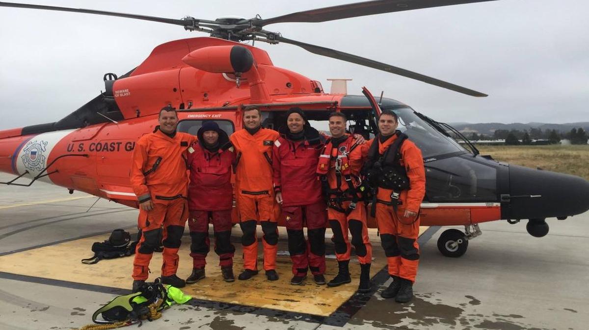 A Coast Guard helicopter plucked two men from a disabled boat in high seas early Tuesday morning after they called for help about 31 miles northwest of Morro Bay.