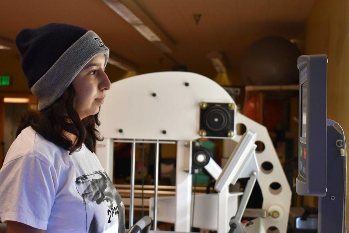 Alyssa Nuño, a 16-year-old Dos Pueblos High School junior, scrutinizes a Biodex Balance System at Santa Barbara Cottage Rehabilitation Hospital. The teen is recovering from serious injuries suffered in a Sept. 3 microburst at the Santa Barbara waterfront.