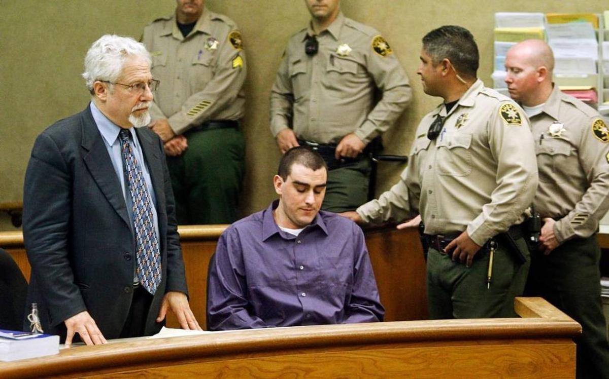John Danner, center, listens in 2015 as jurors find him guilty of second-degree murder in the shooting death of Paso Robles resident Billy Don Law.