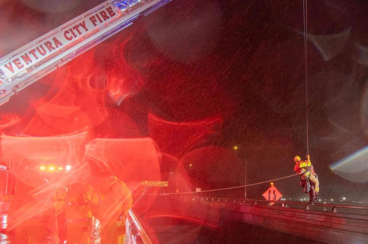 Ventura City Fire Department crews hoist rescue someone who was trapped in the riverbed with rising water on both sides. No injuries were reported in the Sunday evening incident. Crews shut down Highway 101 briefly so crews could conduct the rescue.
