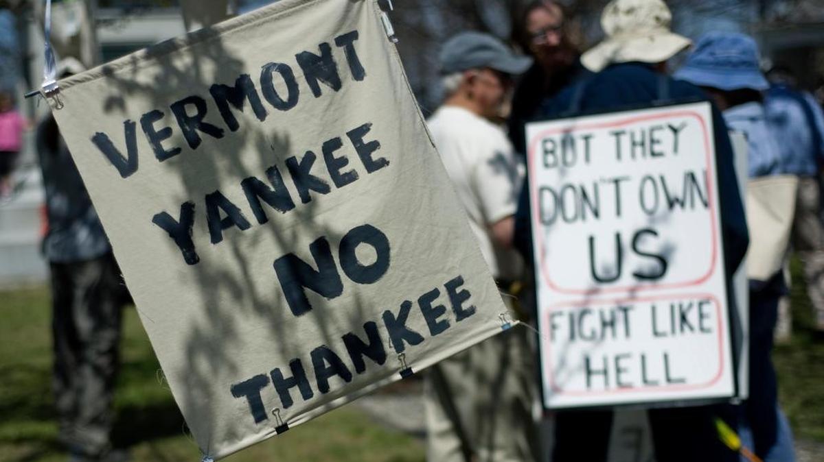 People protest against the continued operation of the Vermont Yankee nuclear power plant at a rally in Brattleboro, Vt., in April 2012. The plant closed in 2014.