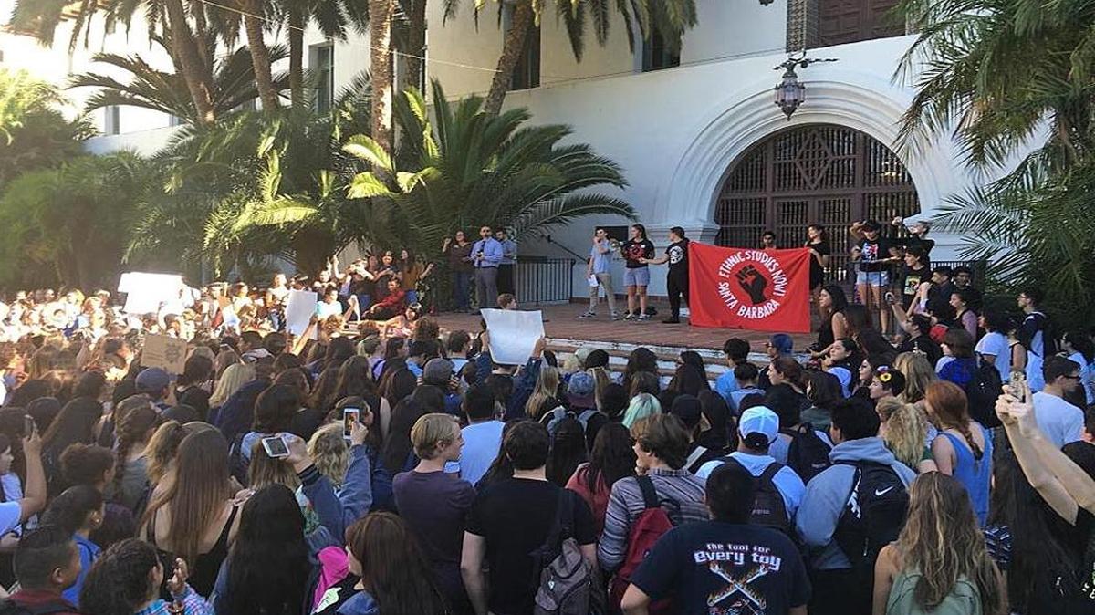 Hundreds of Santa Barbara High School students march from campus to the Santa Barbara County Courthouse Sunken Gardens on Wednesday to protest the outcome of the presidential election.