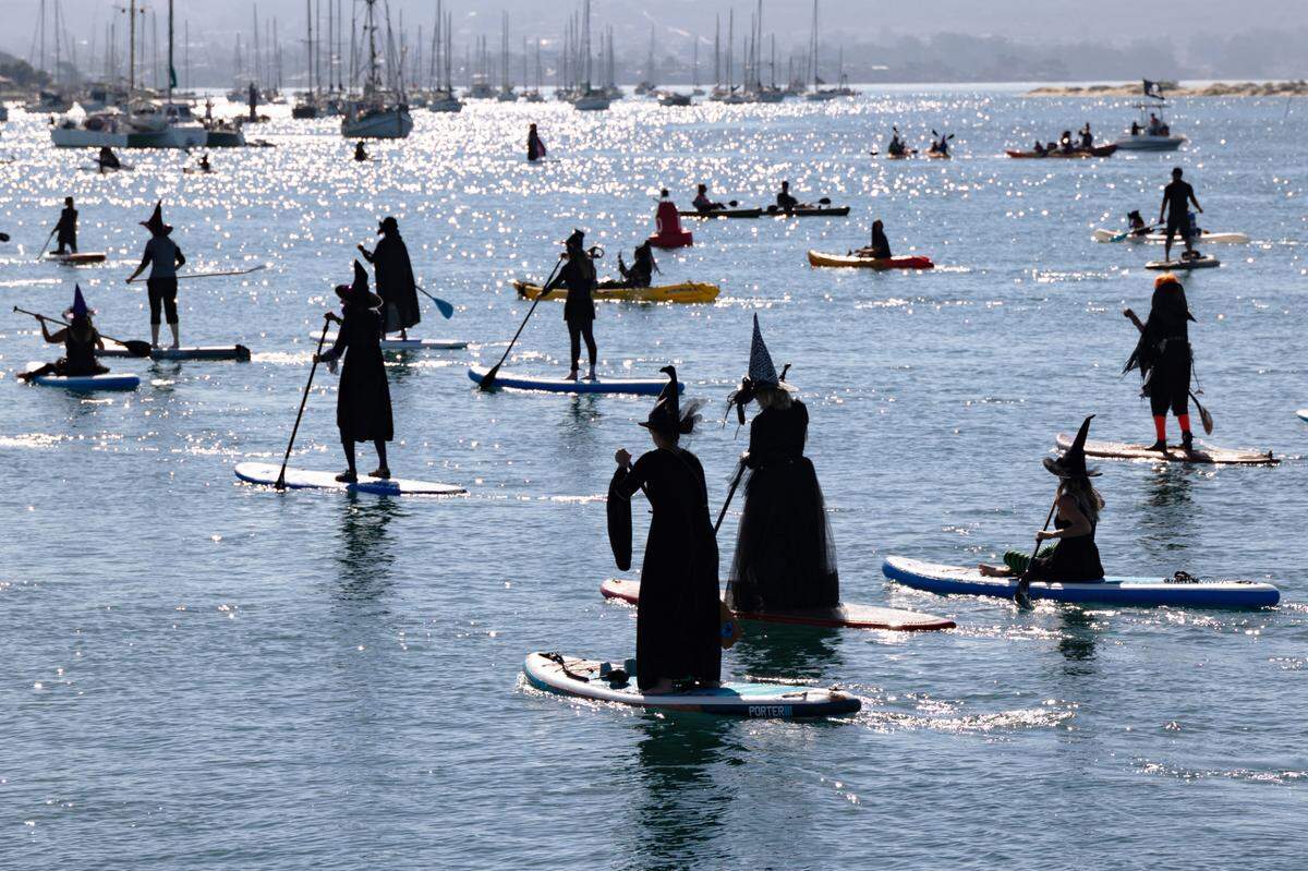 Hundreds of people turned out for the 10th annual Witches and Warlocks Paddle in Morro Bay on Oct. 29, 2023.
