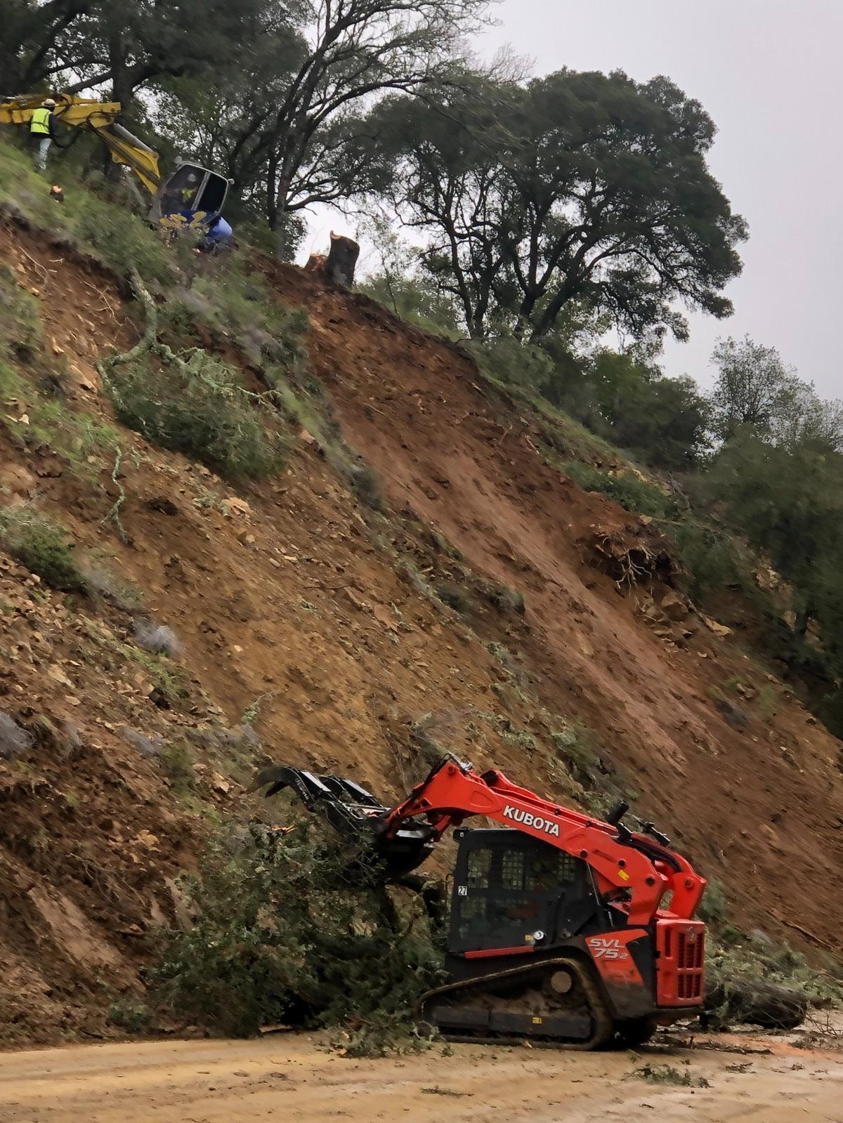 Crews work to repair slides on Highway 41 west of Atascadero on March 17, 2023.