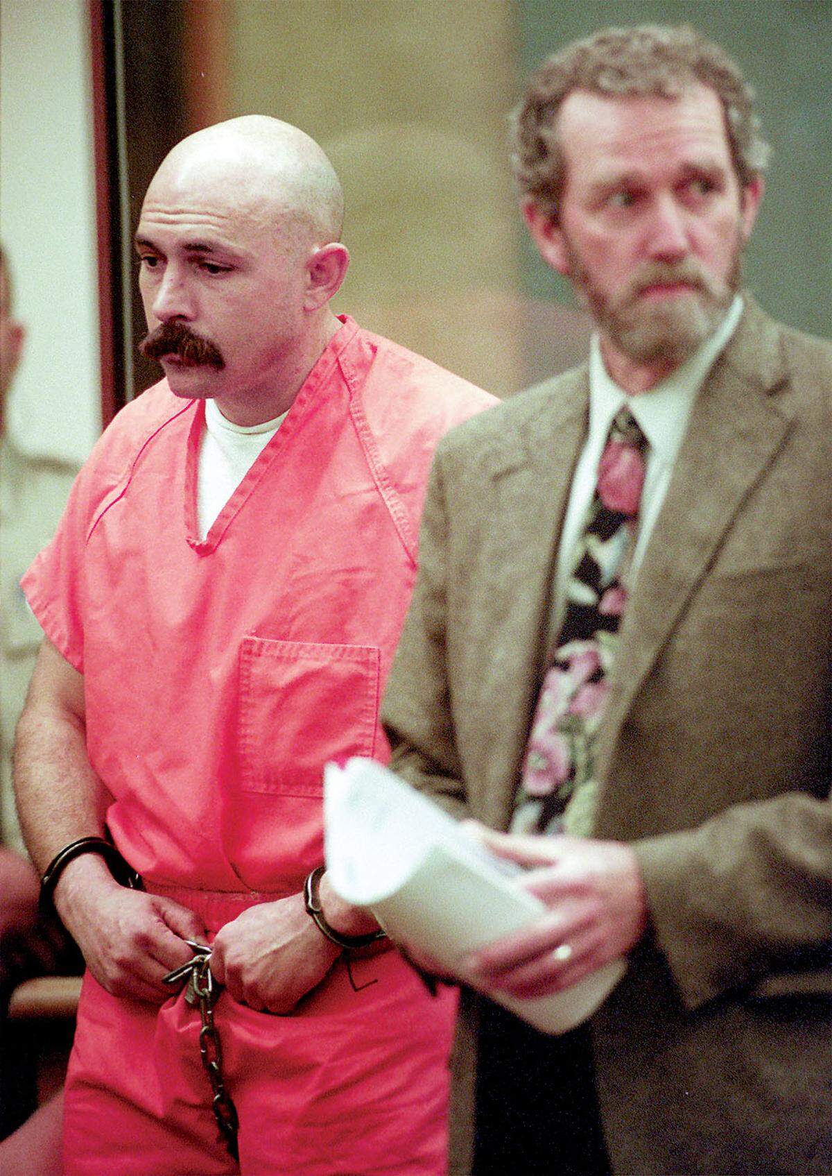 Rex Krebs with public defender James B. Maguire at his arraignment in 1999.