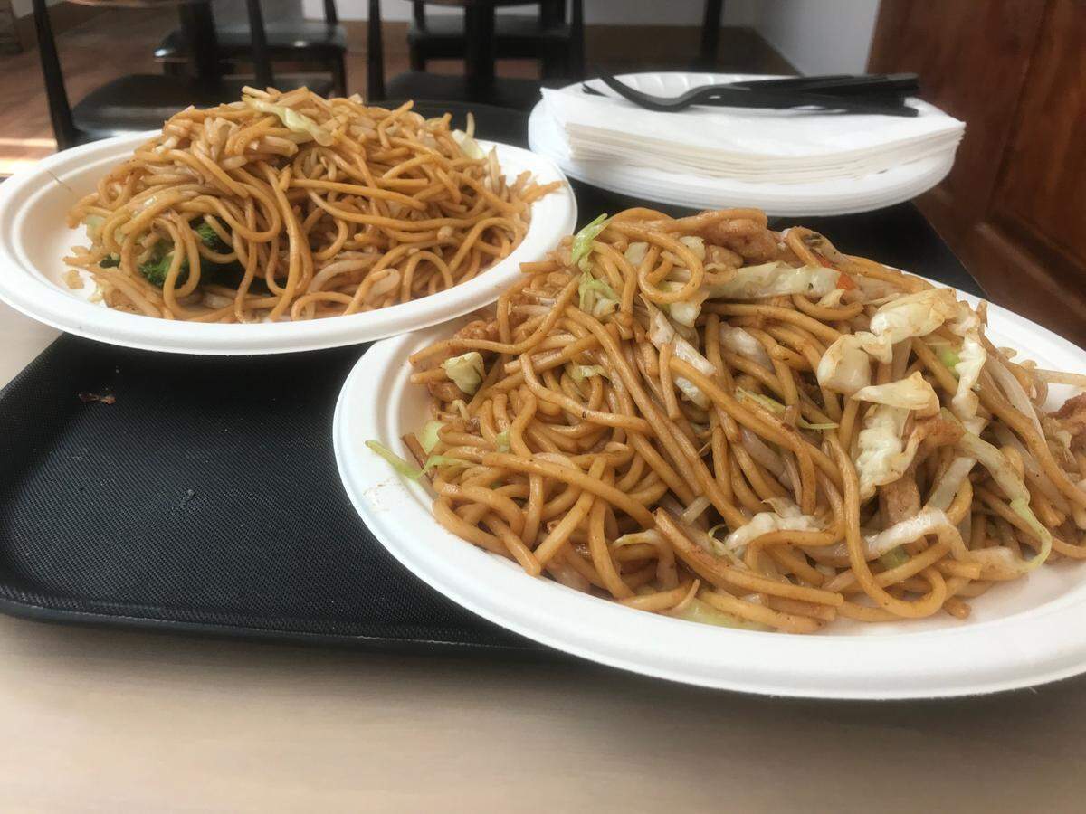 These vegetable (at left) and chicken chow mein entrees seemed to be a hit with diners June 10 at the new Panda Panda Chinese Restaurant in Morro Bay.